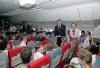 President Ronald Reagan and Nancy Reagan visiting with returning American hostages aboard TWA Flight 847 at Andrews Air Force Base 07/02/1985  NAID: 75854183