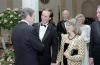 President Ronald Reagan speaking with Dr. Robert Ballard (who found the Titanic on 09/01/1985) and Marjorie Ballard in the Entrance Hall at a dinner for Princes Charles and Princess Diana of the United Kingdom 11/09/1985  NAID: 75854407