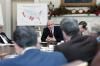 President Ronald Reagan attending a joint meeting of Domestic and Economic Policy Councils on AIDS programs in the Cabinet Room 12/19/1985 