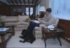 President Ronald Reagan writing the State of the Union Address with Lucky sitting by him at Camp David 02/02/1985  NAID: 75853923