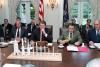 President Ronald Reagan viewing a model of NASA rockets during a National Security council (NSC) meeting in the Cabinet Room 05/15/1986  NAID: 276564353