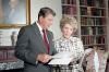 President Ronald Reagan and Nancy Reagan working on their Address to the Nation on the Campaign Against Drug Abuse in the White House Library 09/11/1986  NAID: 75855021