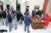 President Ronald Reagan preparing to deliver his Address to the Nation on the Situation in Nicaragua with Special Assistant to the President and Director of the Television Office Elizabeth Board in the Oval Office 03/16/1986NAID: 75854667