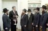 President Ronald Reagan receiving a menorah from the Friends of Lubavitch in the Oval Office 12/15/1987  NAID: 6728689