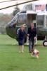 President Ronald Reagan and Nancy Reagan being greeted by Rex after arriving at the White House via Marine One 04/20/1987 NAID: 75855397