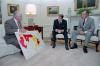 President Ronald Reagan and Vice President George Bush meeting with Secretary of Agriculture Richard Lying to discuss the status of the drought situation in the Oval Office 06/17/1988  NAID: 75856165