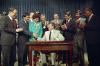 President Ronald Reagan signing the Civil Liberties Act of 1988 in the Old Executive Office Building 08/10/1988  NAID: 276564919