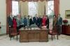 President Ronald Reagan in a photo opportunity with his Century City office staff in the Oval Office Left to right: Fred Ryan, Suzie Talaat, Sherry Seamon, Kathy Osborne, Sandy Warfield, Joanne Hildebrand Drake, Dottie Dellinger, President, Jeanine Chase, Kerry Geoghan, Kerri Douglas, Selina Jackson, Paula Franklin, and Mark Weinberg 12/19/1988  NAID: 404525495
