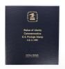 Commemorative Stamp Album, 22c Statue of Liberty [view 1 of 2] Artifact ID: 1986.00606.01a-b Makers: Howard E. Paine (stamp designer, art director, and typographer); United States Postal Service (USPS), Date Made: July 4, 1986