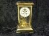 Brass Carriage Clock, L’epee Liberty Clock [view 1 of 2] Artifact ID: 1986.00609.01a-b Maker: Staff of L’epee, clock factory, Sainte-Suzanne/ Montbéliard, Franche-Comté, France Date Made: 1986
