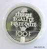 Commemorative Coin, 100 Francs Statue of Liberty (silver) [view 2 of 2] Artifact ID: 1986.00741.05a-b Gifter: François Mitterrand Date: 1986