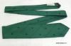 A silk kelly green with narrow navy blue diagonal stripes and navy blue embroidered shamrock. The back interior is lined with navy blue fabric and has a label stating "Creative Expressions By Alynn Neckwear Stamford Conn." Gifter: Nancy Reagan. Artifact ID: 2006.00004.18 A silk kelly green with narrow navy blue diagonal stripes and navy blue embroidered shamrock. The back interior is lined with navy blue fabric and has a label stating "Creative Expressions By Alynn Neckwear Stamford Conn." Gifter: Nancy Reagan. Artifact ID: 2006.00004.18