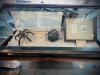 Full object display commemorating the 80th anniversary of D-Day on June 6, 2024, at the Ronald Reagan Presidential Library and Museum. Full display of case containing items from D-Day including a helmet, grappling hood and secret maps.