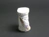 [View 2 of 5] Shrunken Challenger Coffee Cup Artifact ID: 1986.31470.01 Maker: Roger W. Cook, Director, Marine Operations, Harbor Branch Foundation Inc., Fort Pierce, Florida Date Made: 1986 Label Text: This cup was placed in the battery compartment of the submersible used by the donor's company to search for the Space Shuttle Challenger. The size of the cup was reduced under pressure at 1284 Ft.