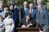 President Ronald Reagan signing H.J. Res. 407, a joint resolution designating the 12-month period pending on October 28, 1986 as the “Centennial year of Liberty in the United States,” in the Rose Garden