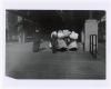 Photograph of Immigrants Walking with Luggage on Ellis Island Public Health Service Historical Photograph File 1880-1943 Record Group 90 Records of the Public Health Service 1794-1990. NAID: 595659