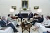 President Ronald Reagan meeting for a briefing on his upcoming meeting with President François Mitterrand of France in the Oval Office 07/03/1986