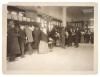 Photograph of Immigrants Buying Railroad Tickets on Ellis Island Public Health Service Historical Photograph File 1880-1943 Record Group 90 Records of the Public Health Service 1794-1990. NAID: 595656