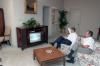 President Ronald Reagan and Vice President George Bush watching Nancy Reagan on television at the Republican National Convention from their hotel in Dallas, Texas 08/22/1984