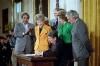 President Ronald Reagan with Nancy Reagan during the signing ceremony for H.R. 5484 – The Ant-Drug Abuse Act of 1986 with Senator Paula Hawkins and Representatives Charles Rangel and Benjamin Gilman in the East Room dated 10/27/1986