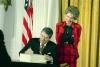 President Ronald Reagan, with Nancy Reagan, signing H.R.5210 the Anti-Drug Abuse Act of 1988 in the East Room dated 11/18/1988 NAID: 75856383