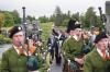 President Ronald Reagan waving and walking with bagpipers prior to departure via Marine One from Ballyporeen, Ireland for Dublin, Ireland, 06/03/1984 President Ronald Reagan waving and walking with bagpipers prior to departure via Marine One from Ballyporeen, Ireland for Dublin, Ireland, 06/03/1984
