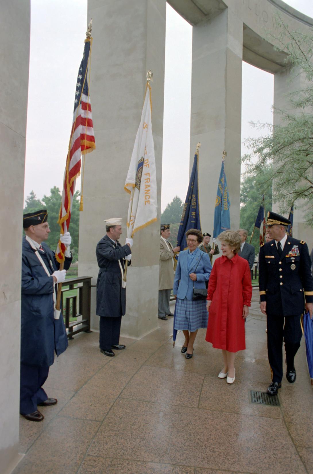 Nancy Reagan walking with Army Officers and Antoinette de Beranger.