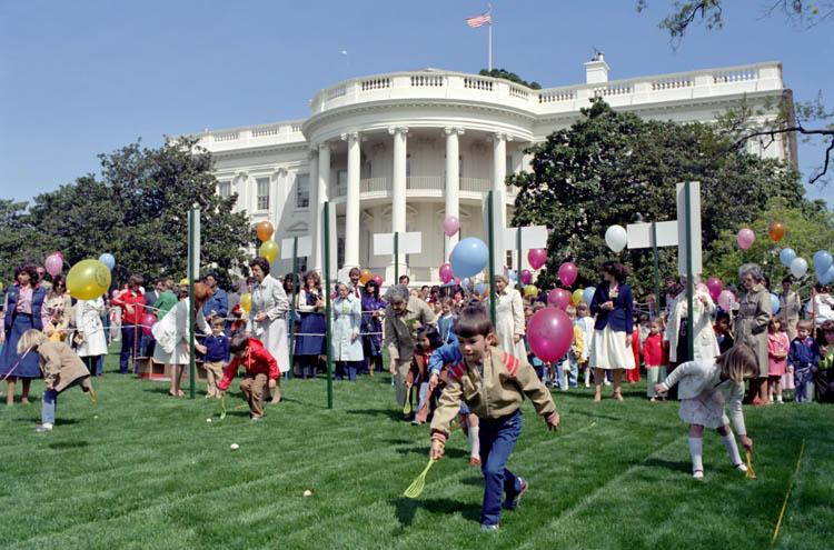 Children playing the South Lawn during the Easter Egg Roll 04/20/1981 NAID: 276563161