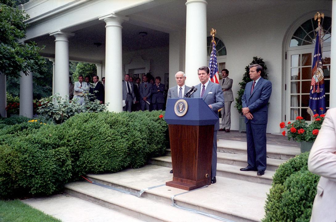 President Ronald Reagan delivering remarks and participating in a question-and-answer session with reports on the air traffic controllers strike in the Rose Garden 08/03/1981 NAID: 75854663
