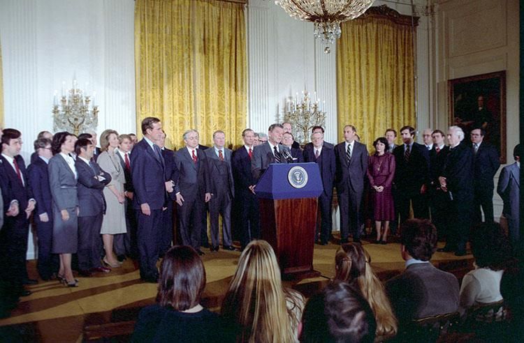 President Ronald Reagan delivering his Remarks at the Swearing-In Ceremony for Members of the White House Staff in the East Room 01/21/1981 NAID: 75852917