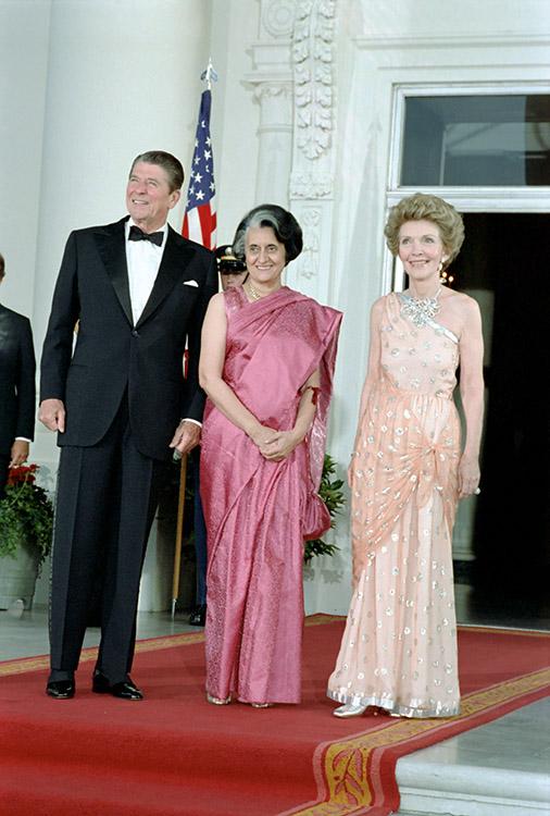 President Ronald Reagan, Prime Minister Indira Gandhi of India, and Nancy Reagan on the North Portico of the White House before the state dinner 07/29/1982 NAID: 75856937