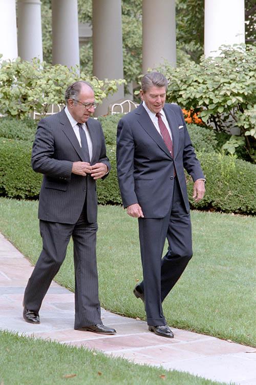 President Ronald Reagan talking with Ambassador Philip Habib, Special Emissary to the Middle East, outside the Oval Office 10/06/1982  NAID: 75852451