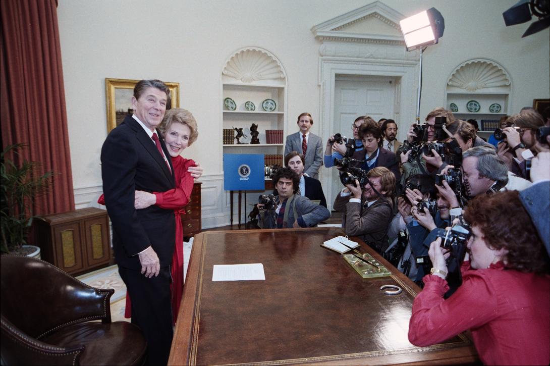 Nancy Reagan hugs President Ronald Reagan as he makes an Address to the Nation Announcing the Reagan-Bush Candidacies for Reelection 01/29/1984 NAID: 75853221