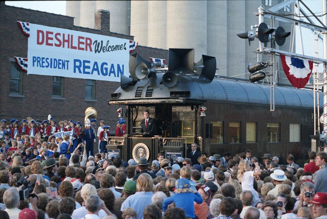 President Ronald Reagan aboard the Ferdinand Magellan railcar delivering remarks in Deshler, Ohio during the whistle-stop tour through Ohio 10/12/1984 NAID: 75853671