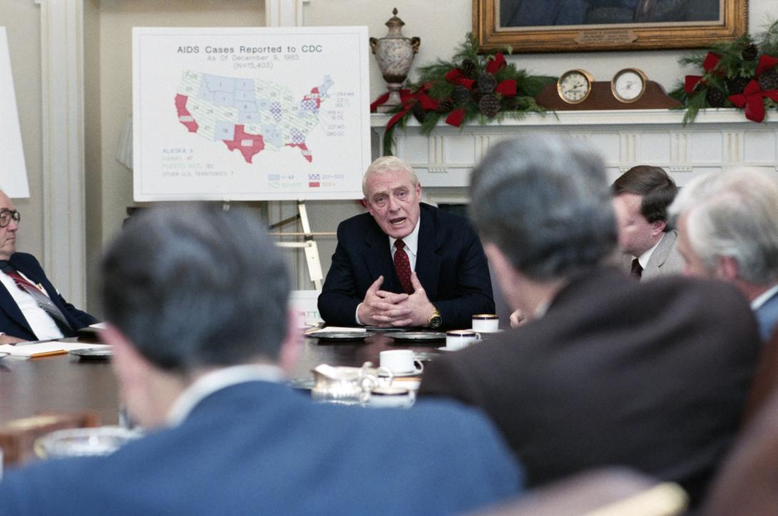 President Ronald Reagan attending a joint meeting of Domestic and Economic Policy Councils on AIDS programs in the Cabinet Room 12/19/1985 