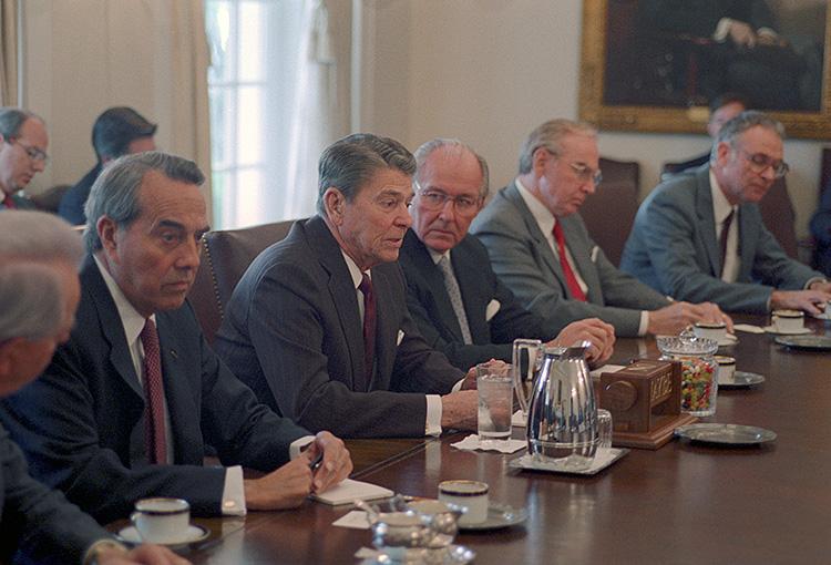 President Ronald Reagan in a Republican Congressional leadership meeting regarding sales of arms to Iran in the Cabinet Room 11/25/1986 NAID: 276564439