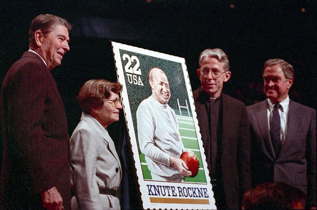 President Ronald Reagan participating in the unveiling of the Knute Rockne Commemorative Stamp at the University of Notre Dame 03/09/1988  NAID: 404525453