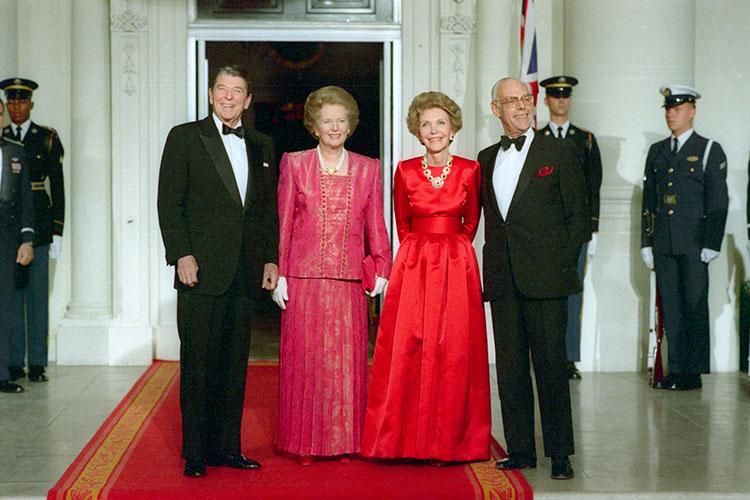 President Ronald Reagan and Nancy Reagan greeting Prime Minister Margaret Thatcher of the United Kingdom and Denis Thatcher on the North Portico of the White House before the state dinner 11/16/1988 NAID: 75856377