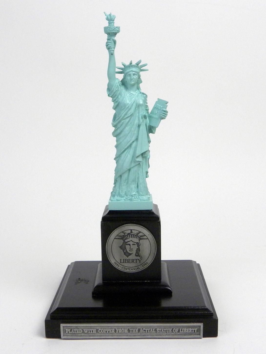 Miniature Statue, Statue of Liberty Artifact ID: 1985.01385.03 Maker: Danbury Mint, American medallic and collectible manufacturer founded in 1969 Norwalk, Connecticut Date Made: 1985