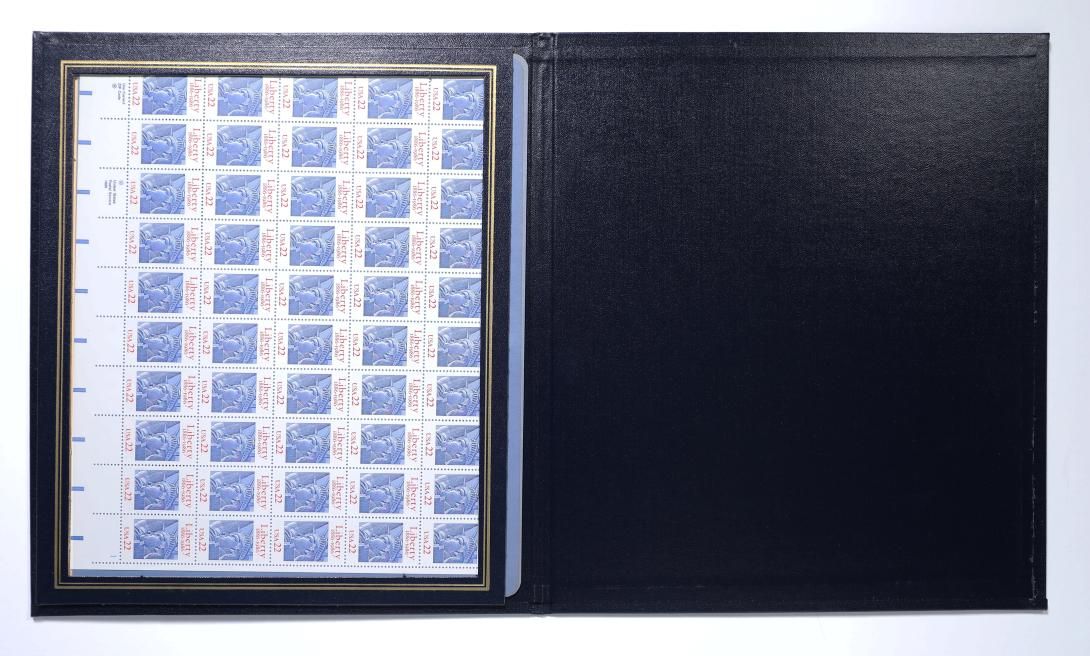 Commemorative Stamp Book, 22c Statue of Liberty [view 2 of 2] Artifact ID: 1986.00606.01a-b Makers: Howard E. Paine (stamp designer, art director, and typographer); United States Postal Service (USPS) Date Made: July 4, 1986