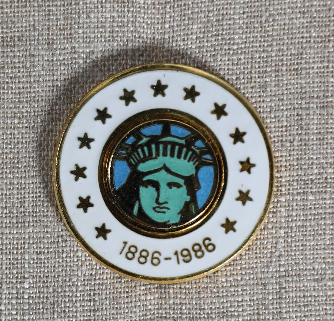 Lapel Pin, Statue of Liberty Pin Artifact ID: 1986.00618.01a-d Date Made: 1986