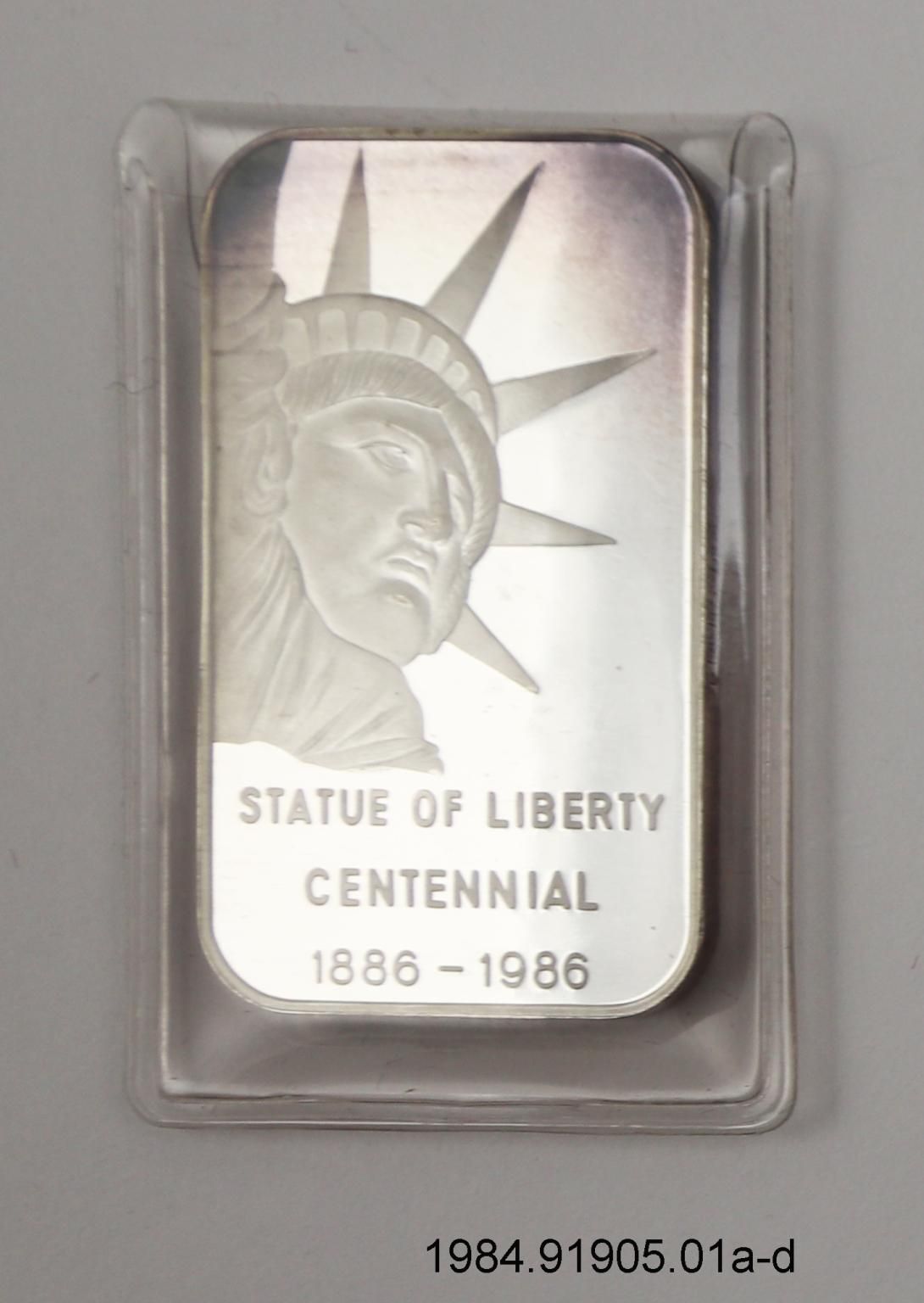 Commemorative silver ingot,  Statue of Liberty Artifact ID: 1984.91905.01a-d Maker: Statue of Liberty Gift Center Date Made: 1984