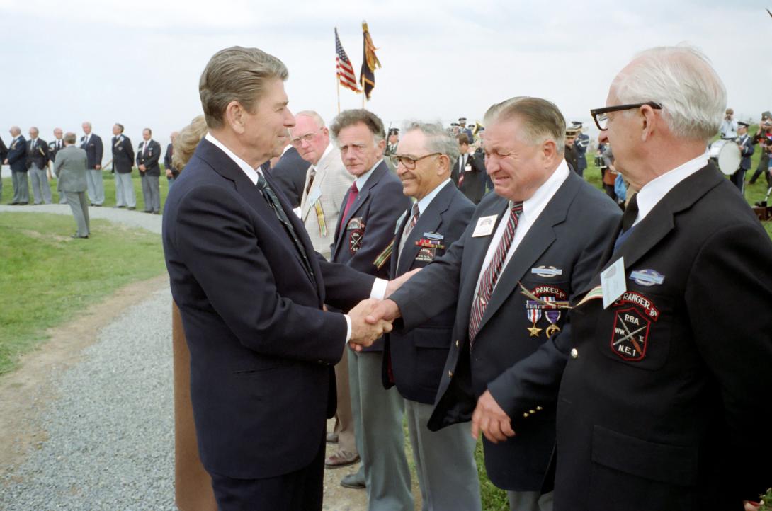 President Reagan and Nancy Reagan greeting former U.S. Army Rangers at Pointe du Hoc, Normandy, France 06/06/1984