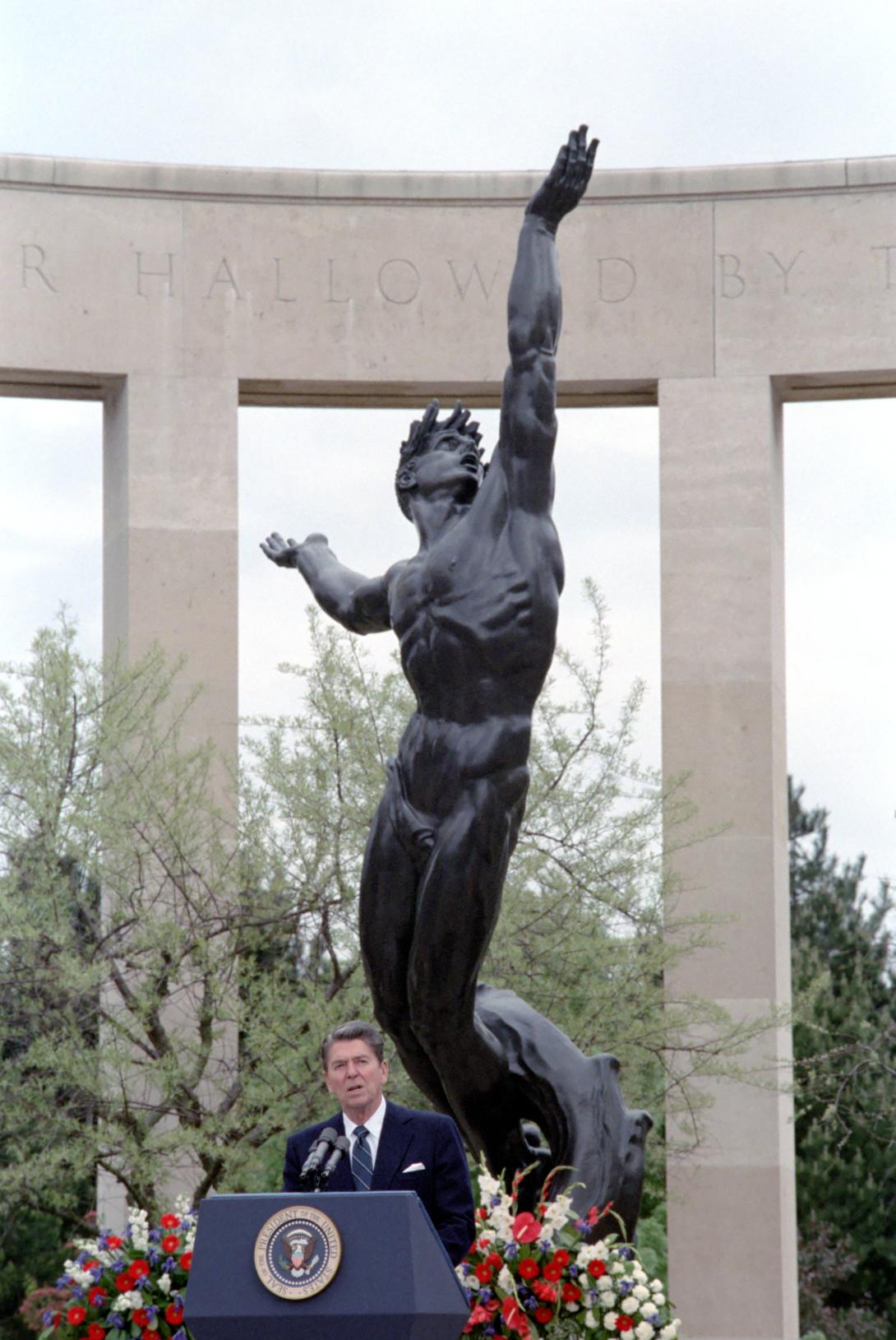 President Reagan delivering his Remarks at a United States-France Ceremony Commemorating the 40th Anniversary of the Normandy Invasion, D-Day, Normandy American Cemetery and Memorial, Colleville-sur-Mer, France 06/06/1984