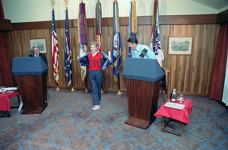 Nancy Reagan showing off her 4 more in ’84 sweater during debate preparation for the upcoming presidential debate on domestic policy between President Ronald Reagan and David Stockman