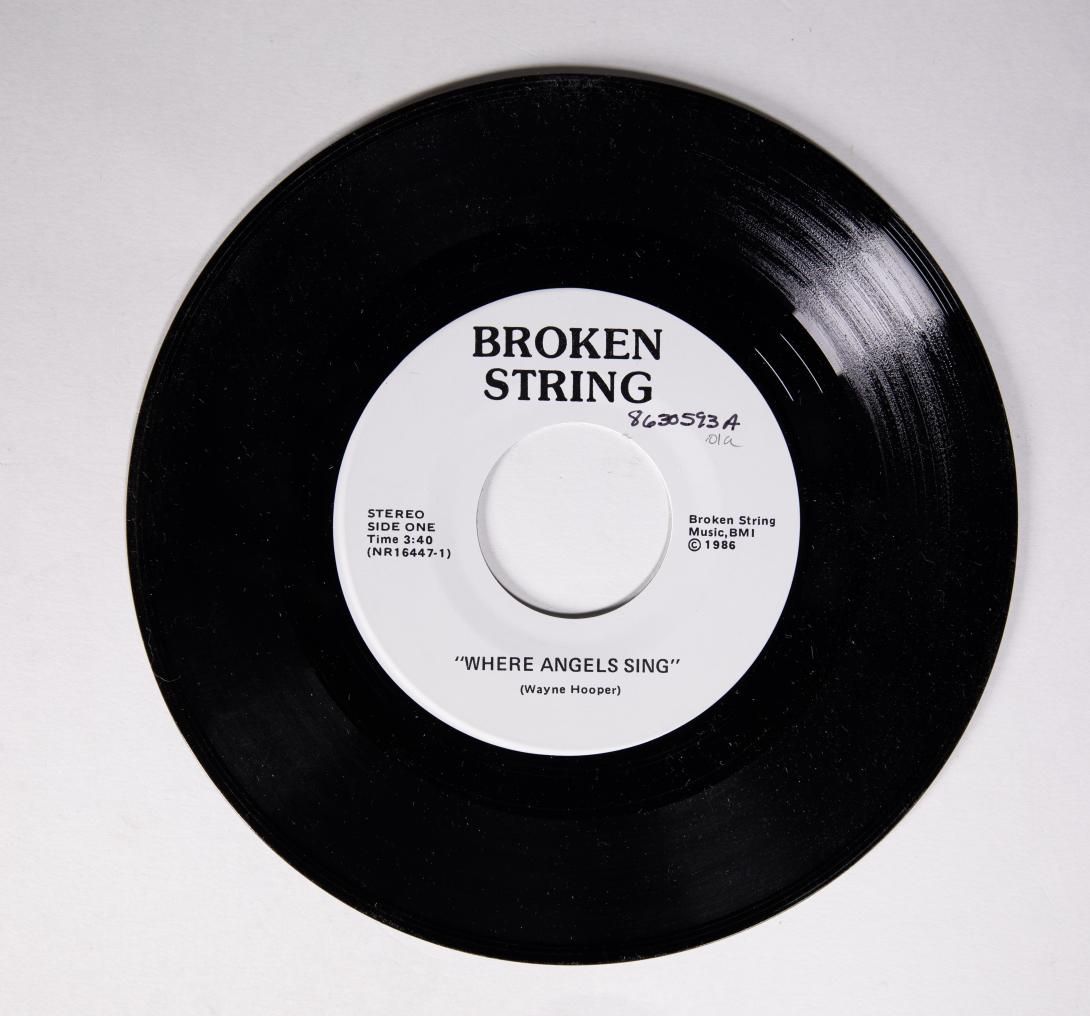 Where Angels Sing Artifact ID: 1986.30593.01a-b Object Name: Album, Record Date Made: 1986 Maker: Broken String Music, Gainesville, Florida Label Text: The song “Where Angels Sing” was written in memory of the Space Shuttle Challenger. Description: A 45 RPM record album single with one song per side, "Where Angels Sing" on Side One and "The Strong Barely Survive" on Side Two (01a), both by Wayne Hooper. The album is inside a white plain record sleeve (.01b).