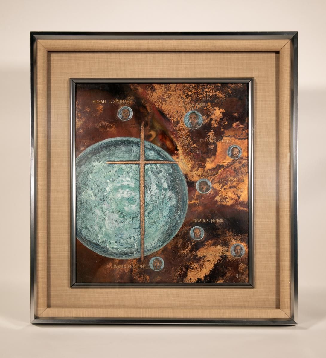 Seven Stars (English translation) Artifact ID: 1986.00497.01 Object Name: Work, Visual Maker: Kensuke Fukuda Country/Culture: Japan Date Made: 1986 Description: A copper repose depicting the abstract likeness of the Space Shuttle Challenger crew Christa McAuliffe, Francis R. Scobee, Ellison S. Onizuka, Ronald E. McNair, Michael J. Smith, Gregory Jarvis and Judith A. Resnik in blue orbs surrounding a larger blue orb with a gold cross superimposed over it. The artwork is in an aluminum frame.