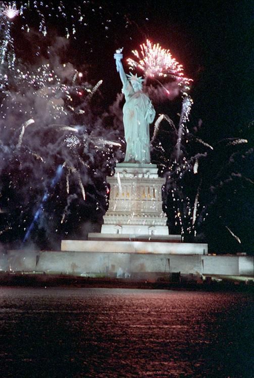 Fireworks near the Statue of Liberty during the opening ceremonies of the Statue of Liberty Centennial Celebration on Governors Island in New York Harbor 07/03/1986