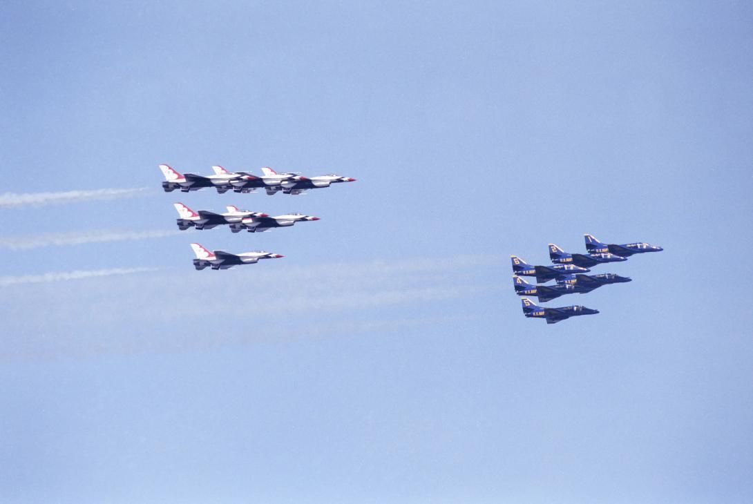 The U.S. Air Force Thunderbirds and the U.S. Navy Blue Angels flying together over New York Harbor and the Hudson River 07/04/1986