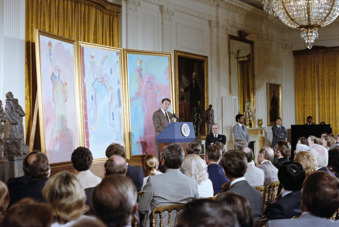 President Ronald Reagan delivering his Remarks Announcing the Formation of the Statue of Liberty-Ellis Island Centennial Commission in the East Room 05/18/1982
